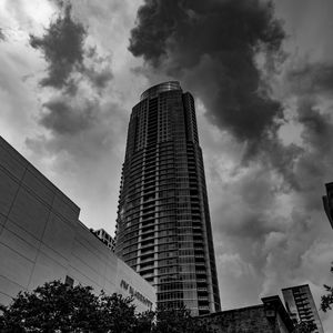 Preview wallpaper skyscraper, bw, facade, clouds