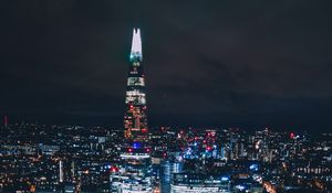 Preview wallpaper skyscraper, city, lights, buildings, night