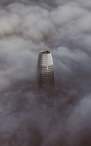 Preview wallpaper skyscraper, clouds, aerial view, building, top, height