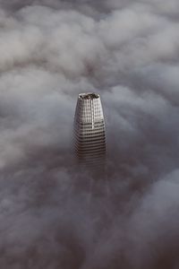 Preview wallpaper skyscraper, clouds, aerial view, building, top, height