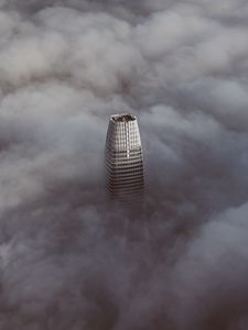 Preview wallpaper skyscraper, clouds, aerial view, building, top, height