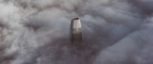 Preview wallpaper skyscraper, clouds, aerial view, building, top, height