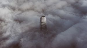Preview wallpaper skyscraper, clouds, aerial view, building, top, height