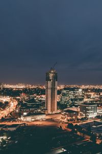 Preview wallpaper skyscraper, construction, buildings, lights, night, city