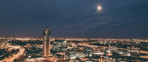 Preview wallpaper skyscraper, construction, buildings, lights, night, city