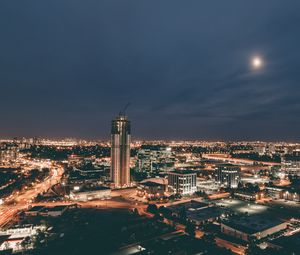 Preview wallpaper skyscraper, construction, buildings, lights, night, city