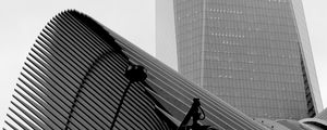 Preview wallpaper skyscraper, fog, roof, spotlight, black and white