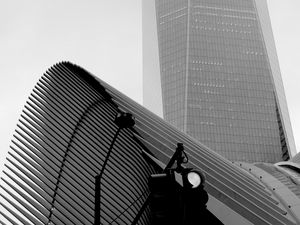 Preview wallpaper skyscraper, fog, roof, spotlight, black and white