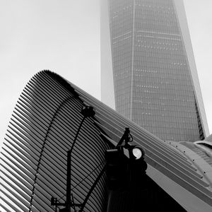 Preview wallpaper skyscraper, fog, roof, spotlight, black and white