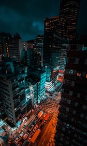 Preview wallpaper skyscraper, road, night city, buildings