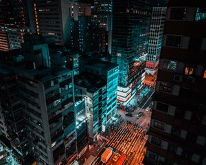 Preview wallpaper skyscraper, road, night city, buildings