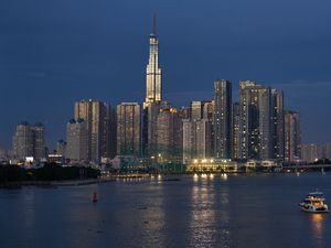 Preview wallpaper skyscraper, tower, buildings, river, lights, city