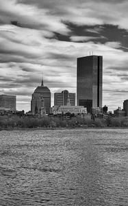 Preview wallpaper skyscraper, tower, buildings, river, city, black and white