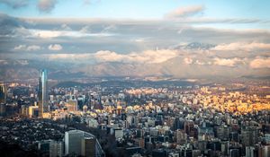 Preview wallpaper skyscraper, tower, buildings, aerial view, mountains