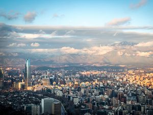 Preview wallpaper skyscraper, tower, buildings, aerial view, mountains