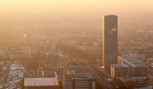 Preview wallpaper skyscraper, tower, buildings, aerial view, city, fog