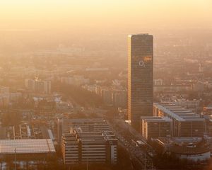 Preview wallpaper skyscraper, tower, buildings, aerial view, city, fog