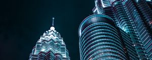 Preview wallpaper skyscrapers, architecture, backlight, view from below, night