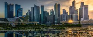 Preview wallpaper skyscrapers, architecture, buildings, city, reflection, water lily
