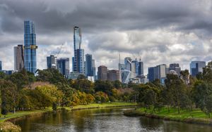Preview wallpaper skyscrapers, architecture, trees, river
