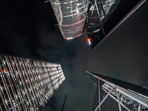 Preview wallpaper skyscrapers, bottom view, architecture, night, dark