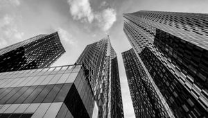 Preview wallpaper skyscrapers, bottom view, black and white, buildings, architecture