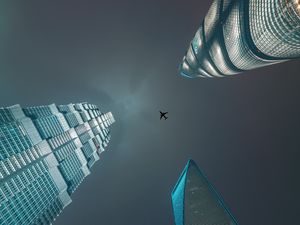 Preview wallpaper skyscrapers, bottom view, plane, minimalism