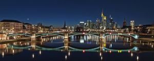 Preview wallpaper skyscrapers, bridge, river, reflection, city, night