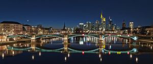 Preview wallpaper skyscrapers, bridge, river, reflection, city, night
