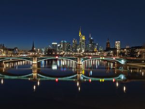 Preview wallpaper skyscrapers, bridge, river, reflection, city, night