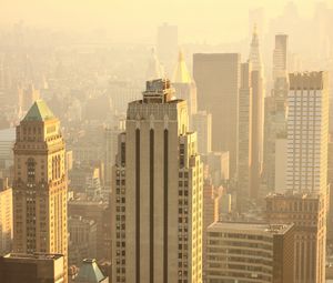 Preview wallpaper skyscrapers, buildings, aerial view, city, fog