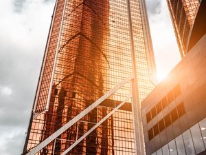 Preview wallpaper skyscrapers, buildings, architecture, facade, sun, sunlight