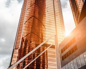 Preview wallpaper skyscrapers, buildings, architecture, facade, sun, sunlight