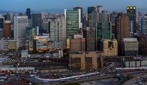 Preview wallpaper skyscrapers, buildings, architecture, towers, apartments, road
