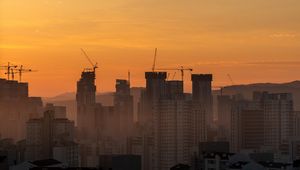 Preview wallpaper skyscrapers, buildings, architecture, sunset, sky