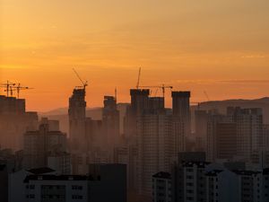 Preview wallpaper skyscrapers, buildings, architecture, sunset, sky