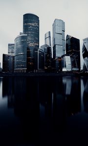 Preview wallpaper skyscrapers, buildings, architecture, water, reflection