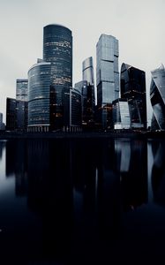 Preview wallpaper skyscrapers, buildings, architecture, water, reflection
