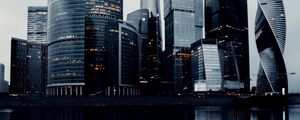 Preview wallpaper skyscrapers, buildings, architecture, water, reflection
