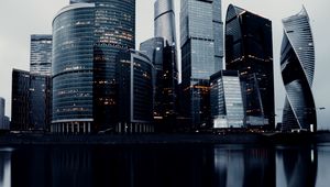 Preview wallpaper skyscrapers, buildings, architecture, water, reflection