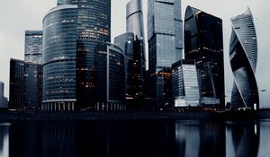 Preview wallpaper skyscrapers, buildings, architecture, water, reflection