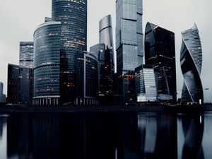 Preview wallpaper skyscrapers, buildings, architecture, water, reflection