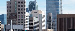 Preview wallpaper skyscrapers, buildings, architecture, flags, city