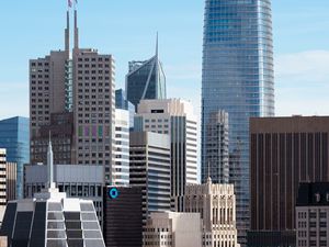 Preview wallpaper skyscrapers, buildings, architecture, flags, city