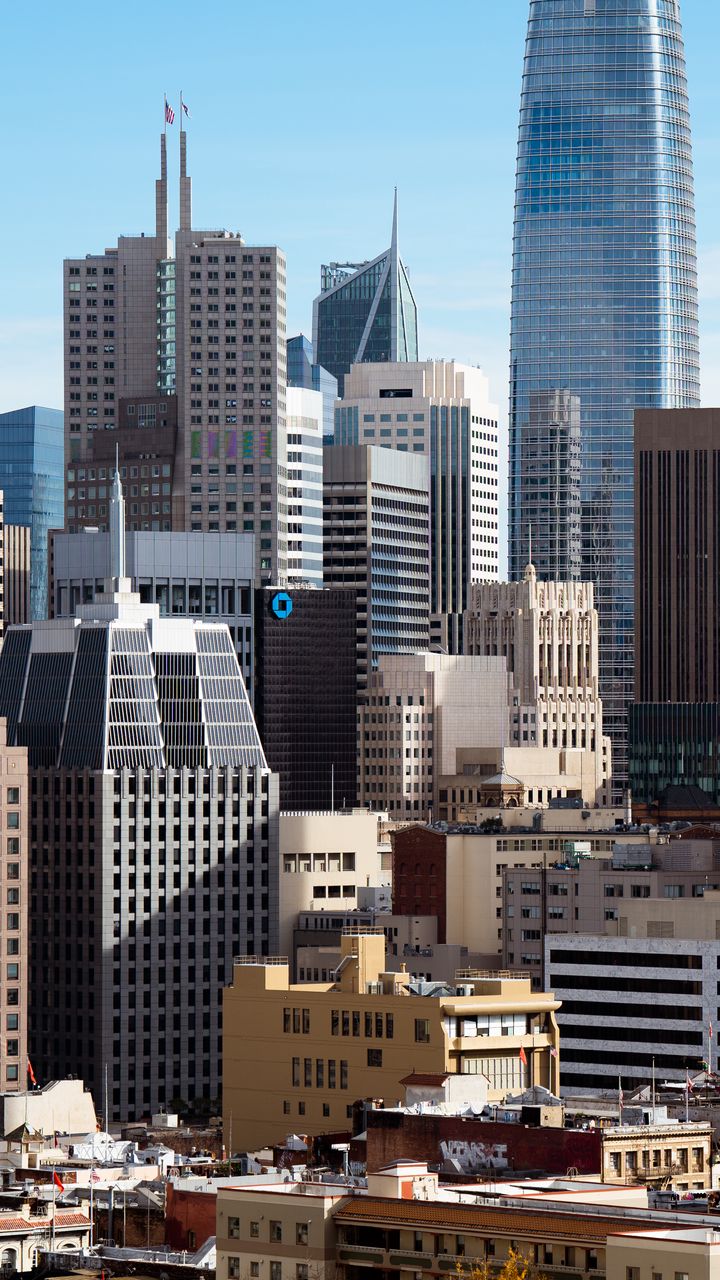 720x1280 Wallpaper skyscrapers, buildings, architecture, flags, city