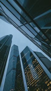 Preview wallpaper skyscrapers, buildings, bottom view, evening