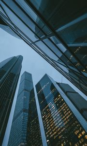 Preview wallpaper skyscrapers, buildings, bottom view, evening