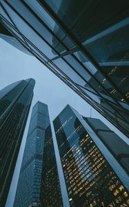 Preview wallpaper skyscrapers, buildings, bottom view, evening