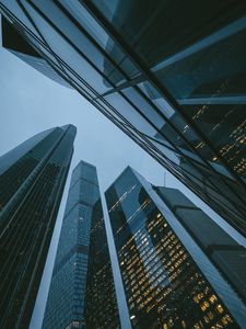 Preview wallpaper skyscrapers, buildings, bottom view, evening