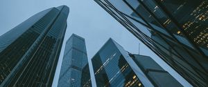 Preview wallpaper skyscrapers, buildings, bottom view, evening